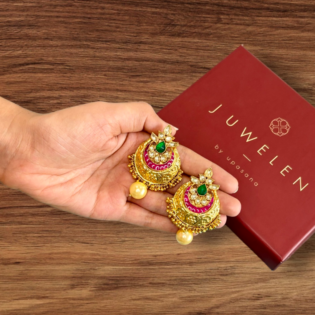 Gold Finished Kundan Earrings with green and pink detailing with pearl drops