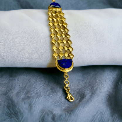 Gold-plated bracelet with royal blue stone