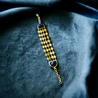 Gold-plated bracelet with royal blue stone