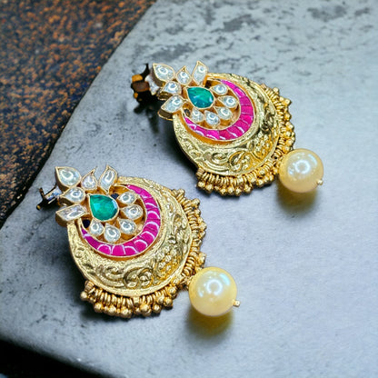 Gold Finished Kundan Earrings with green and pink detailing with pearl drops