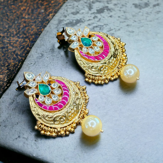 Gold Finished Kundan Earrings with green and pink detailing with pearl drops